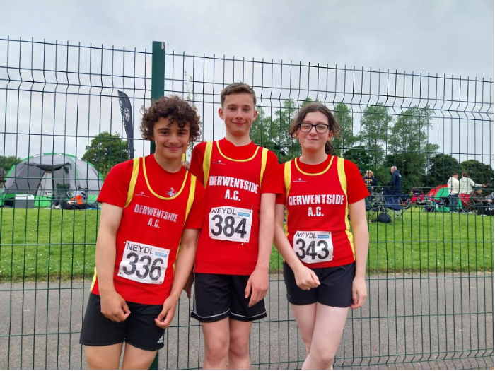 Junior athletes at a track and field event.